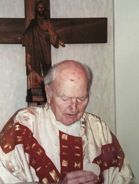 Father Frank celebrating Mass at Santa Teresita Hospital